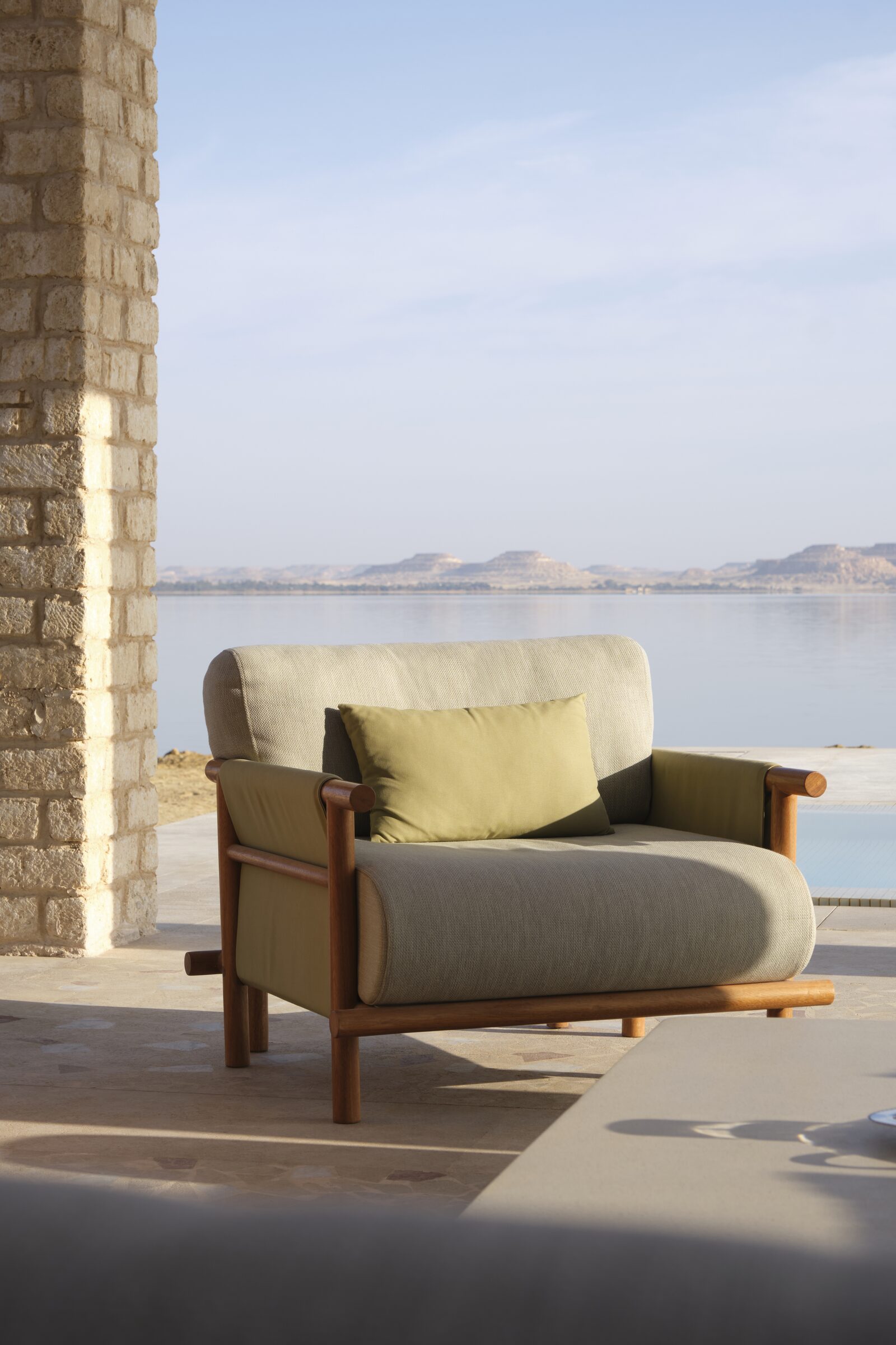 Lounge chair at the water's edge
